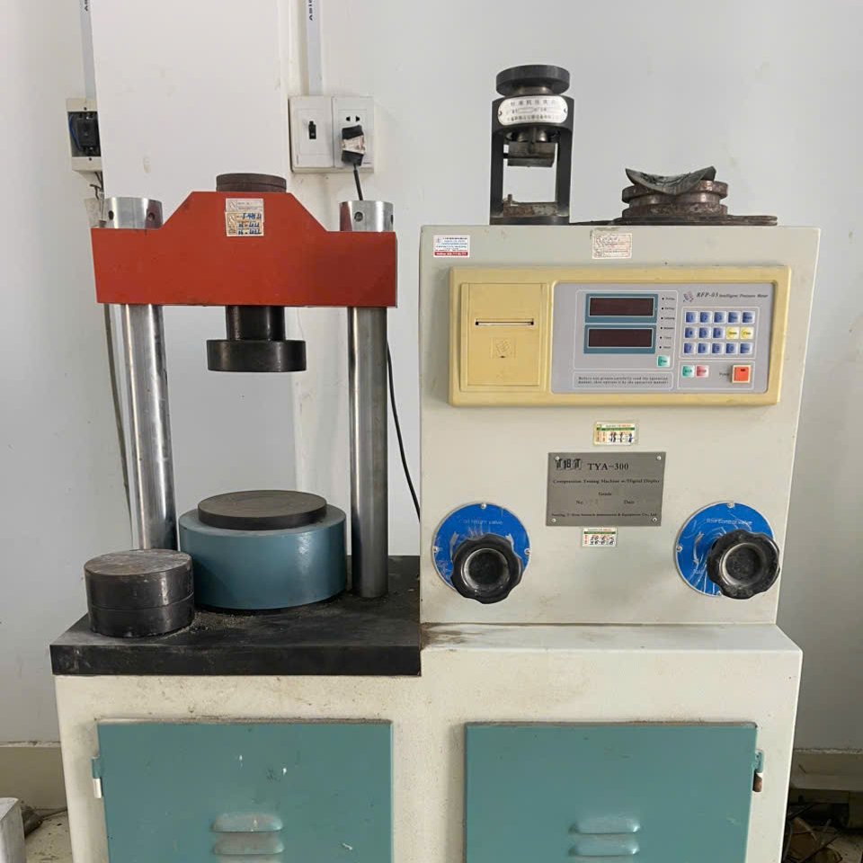 Máy nén gạch vữa xi măng